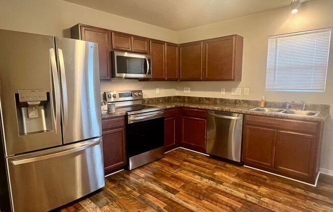 Gorgeous Two bedroom, 2.5 bath townhome in Whitsett-Spring Move in Special $400 off