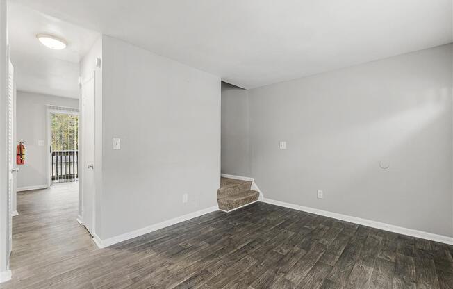 Spacious Living Room New Flooring Throughout  at Pinewood Townhomes, Tucker, GA, 30084