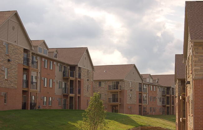 an apartment complex on a cloudy day