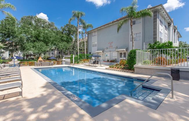 a pool next to a building