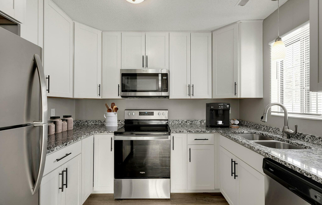 Experience the elegance of this contemporary kitchen, where style meets functionality.