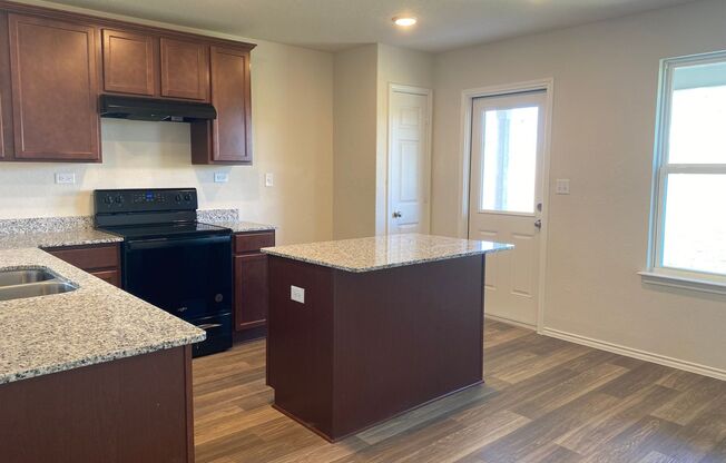 Welcome home to 6231 Windy Green!