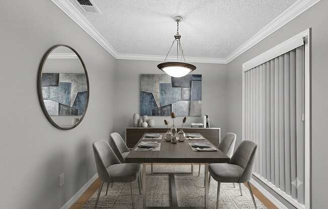 A dining room with a table set for six.