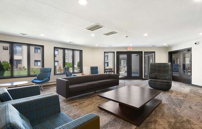 The Edge of Uptown Apartments | Community Room Lounge Area