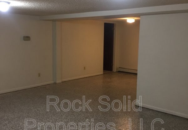 409 W 24 ST