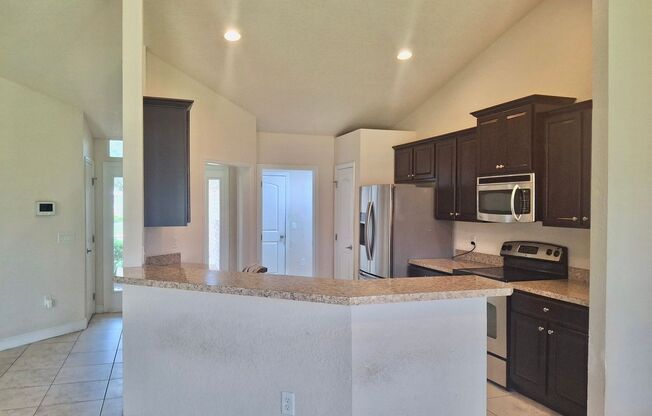Spacious 4-Bedroom Brick Home in Preserve at Heathbrook – Pet Friendly with Fenced Yard!