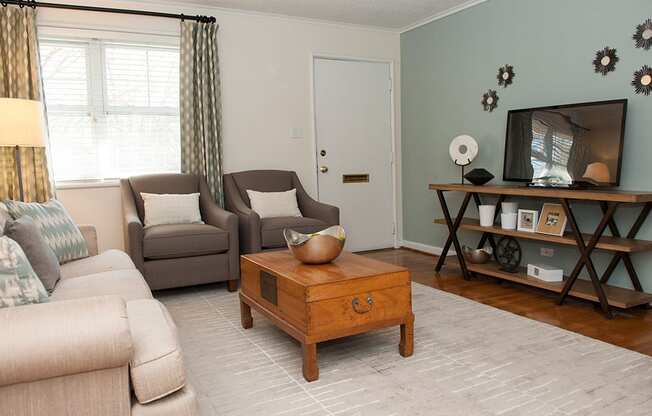 Living Room With Expansive Window at Glen Lennox Apartments, Chapel Hill, NC, 27514
