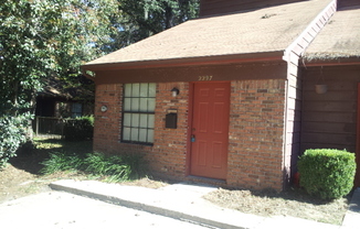 Two Bedroom, Two Bath Townhome With A Private Patio & Fenced Backyard.