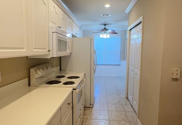 Adorable 2-bedroom, 2-bathroom 1st floor condo located in desirable Canopy Walk, Palm Coast, FL.