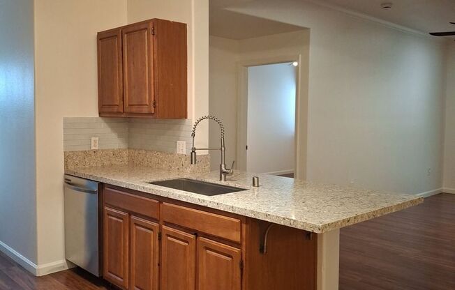 Move in Special 1/2 of one months Rent:Gated Reserves - 3 Bed, 2 Bath -Downstairs - Access to Pool, Gym, and More! 2 Assigned Parking