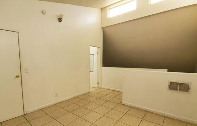 Stylish Loft Condo with Spacious Backyard