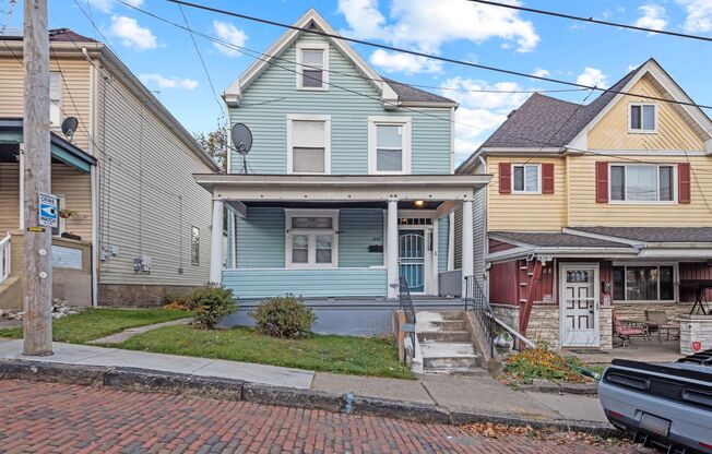 Newly updated with fresh paint, HUGE YARD, and NICE PORCH!