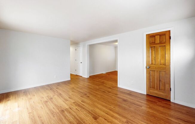 Spacious updated 3 bed/3 bath home w/AC and fenced in back yard