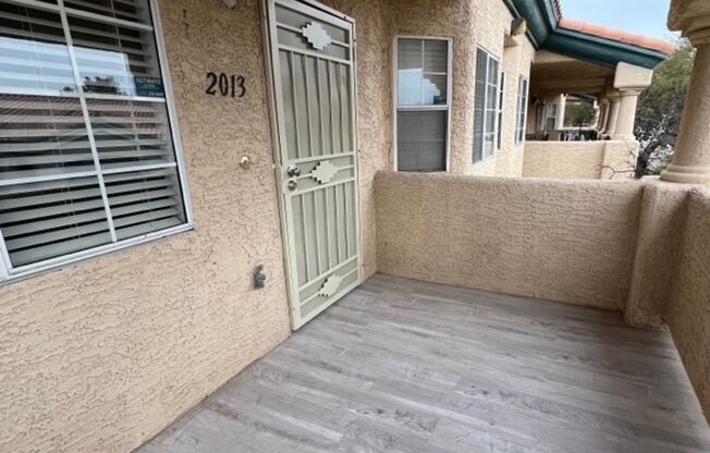 Gated 2 bedroom Condo with new carpet and paint