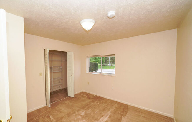 Bedroom with Walk In Closet at The Highlands Apartments in Elkhart, IN