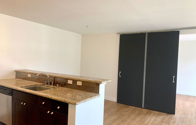 Top floor unit in highly desirable Press condominium building.  1 bed 1 bath with parking.