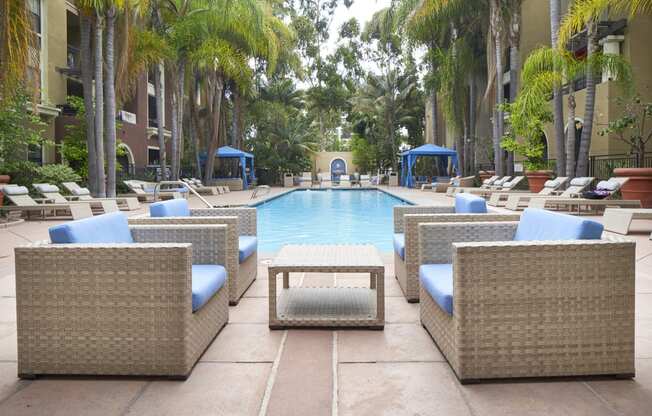 Outdoor pool area with lounge chairs