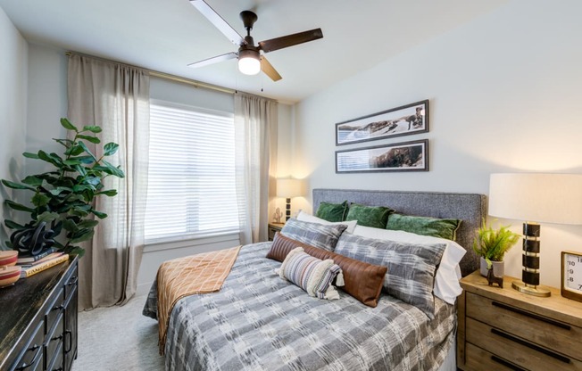 our apartments offer a spacious bedroom with a ceiling fan