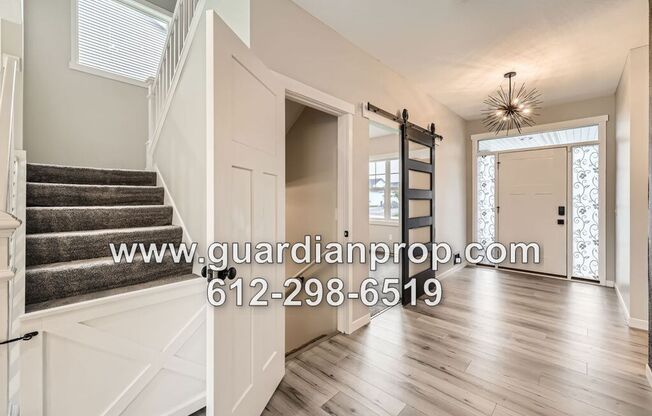 Executive Andover House Available Now, Open Floor Plan, Lower Family Room, 4 Car Garage, Fenced Yard!