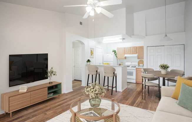 a living room with a couch and a table with chairs