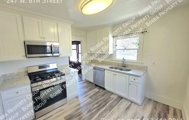 247 W 8 ST
