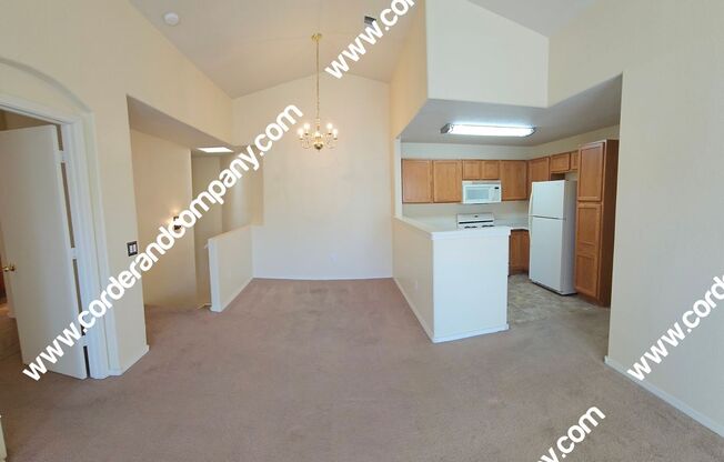 Charming 2 Bedroom, 2 Bathroom, 1 Car Garage and 938 Sq Ft. Condo.