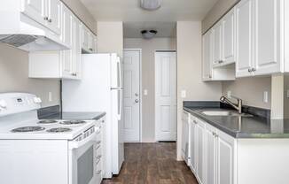 The Crossings| Kitchen with White Cabinets