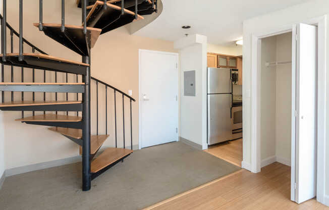 The Lofts - Apartment Entrance with Spiral Staircase