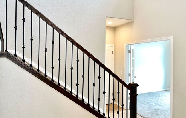 Built in 2021- Stunning 5 Bedroom 4 bath Home Nestled in Highline At Wolf Ranch