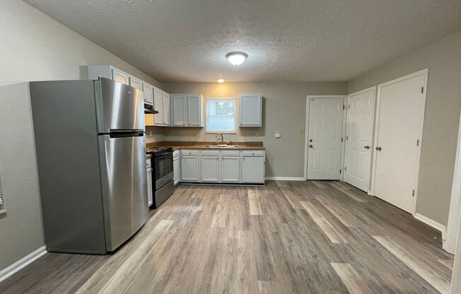 Newly Renovated 2 story 3 Bedroom and 1 bath house!- First Month's Rent Free!