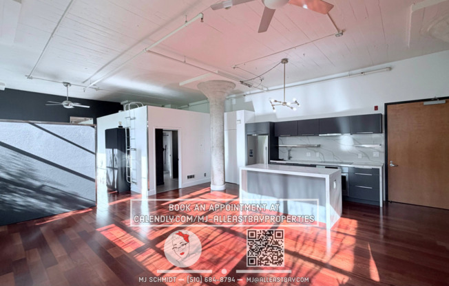 Sunny loft with in unit gym, heated floors in bathroom, contemporary kitchen, and includes water/garbage/1parking!