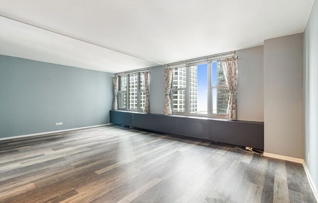 Upgraded Large Convertible in Prime Location of Lakeshore East