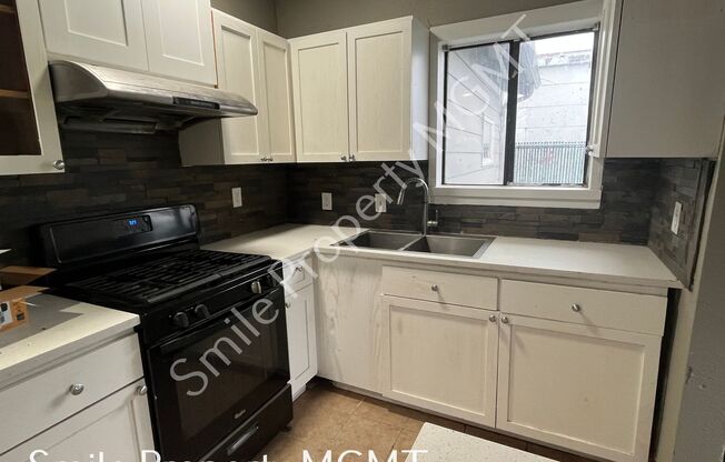 A nice house with 3 beds rooms and 1.5 baths.