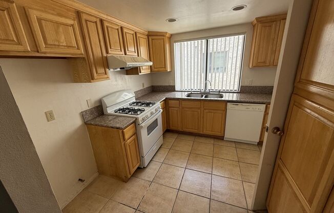 Spacious and light-filled 3-bedroom, 2.5-bath townhome with a bonus den in the heart of Alhambra
