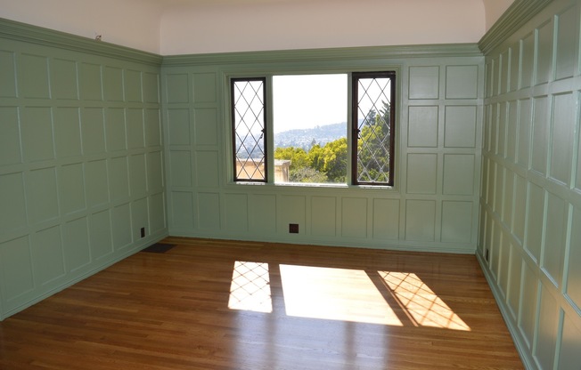 Fantastic Views with vine covered grand Tudor style home with slate roof.