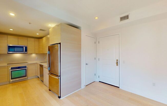 Top Floor Updated One Bedroom W/Sleek Appliances, Washer/Dryer Combo in Amazing Location!
