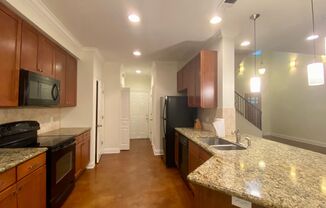 3 br 3.5 bath gated luxury condo with dbl garage, minutes to LSU