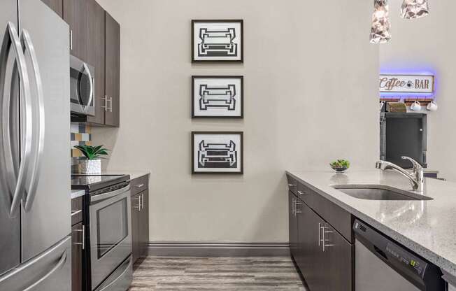 A modern kitchen with a coffee bar.