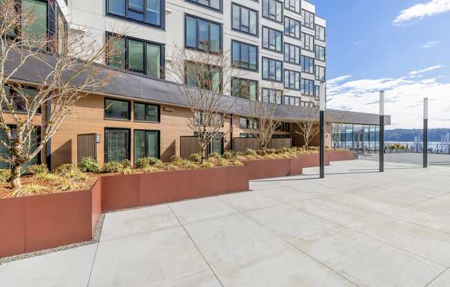 a view of a building with a large terracotta planter in front of it at Marina Square, Bremerton, Washington 98337