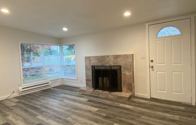 Renovated single family home in Seattle! Beautiful fireplace and fixtures!