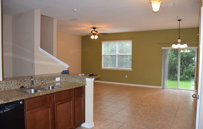 Spacious 3 Bed 2.5 Bath Condo in Gated Tucker Oaks Community with No Rear Neighbors!