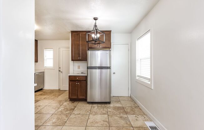 Spacious 4 Bed, 2 Bath Pet-Friendly Home with Central Air & Garage! - Available NOW!
