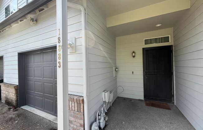 Beautiful Two-Level Townhouse with Gas Fireplace, Vaulted Primary Suite, and Fenced Backyard!