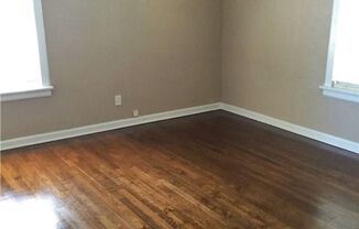Remodeled 1 story home in Hurst with original plank wood flooring