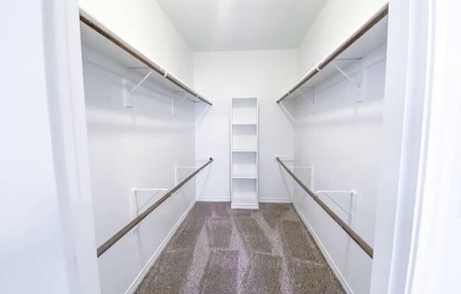 Oversized walk in closet at Tuscany Square Apartments in North Dallas, TX. Now leasing studios, 1 and 2 bedroom apartments.