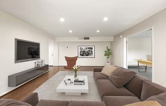 Large Living Room with Wood Floors and Recessed Lighting