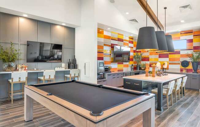 a blurry picture of a room with tables and chairsat Weylyn Luxury Apartments, Laveen, AZ