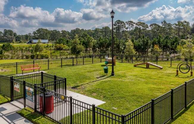 A dog park with obstacle course at the Flats at Sundown in North Port, Florida