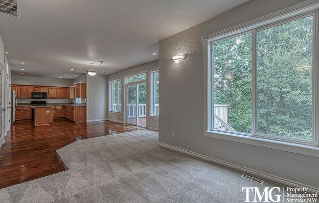 Beautiful 4br/2.5ba home with 3 car garage, deck, AC and more!