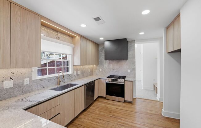 Stunning 3BR Home in Wilmore/South End with Sunroom & ADU Opportunity!